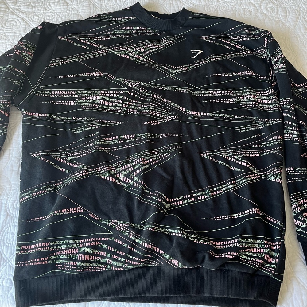 Gymshark green and pink crew neck. Size small but definitely fits oversized.